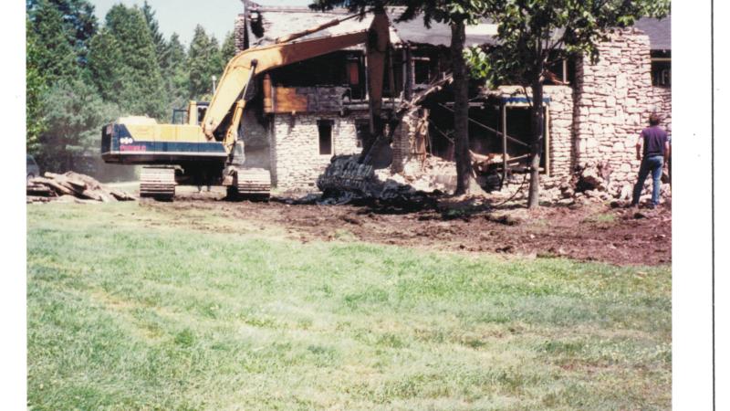 The badly burnt lodge gets demolished