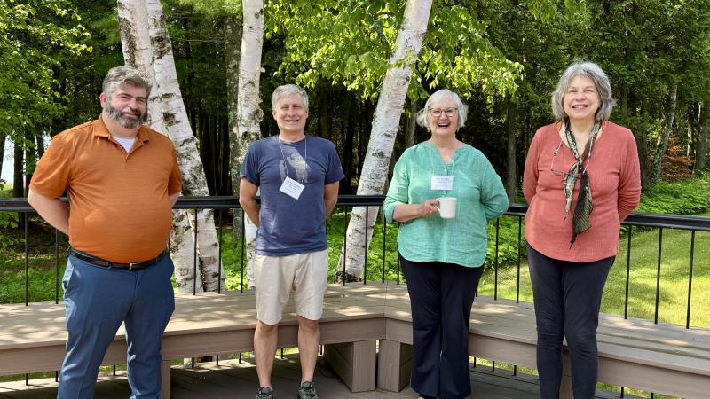 Saints and Sinners in the Middle Ages pose on the deck.