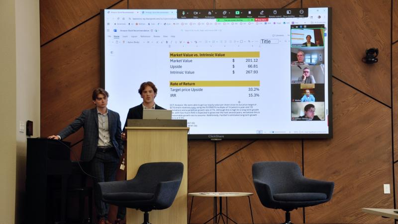 Cody Brekke and Carter Cloutier, both rising juniors, present their investment pitch to a panel of alumni connected remotely.