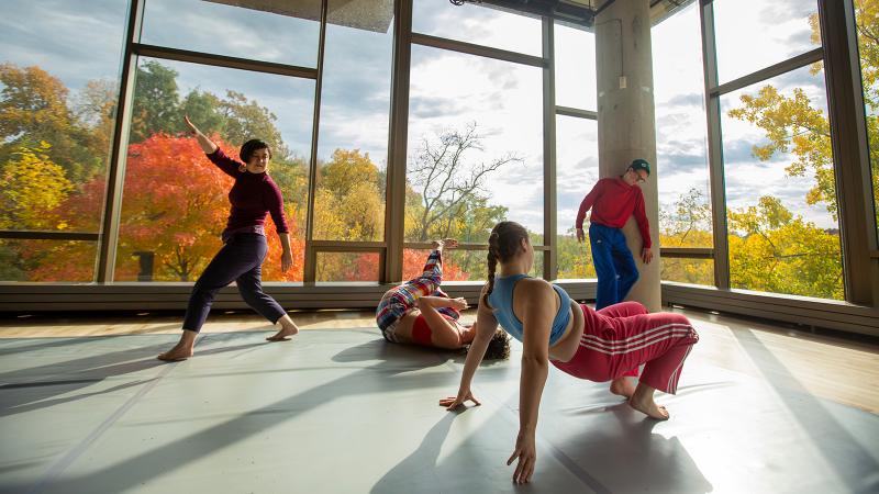 A quartet of dancers in various poses.