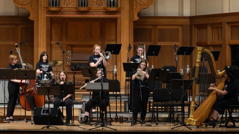 A small ensemble of all-female jazz musicians in performance.