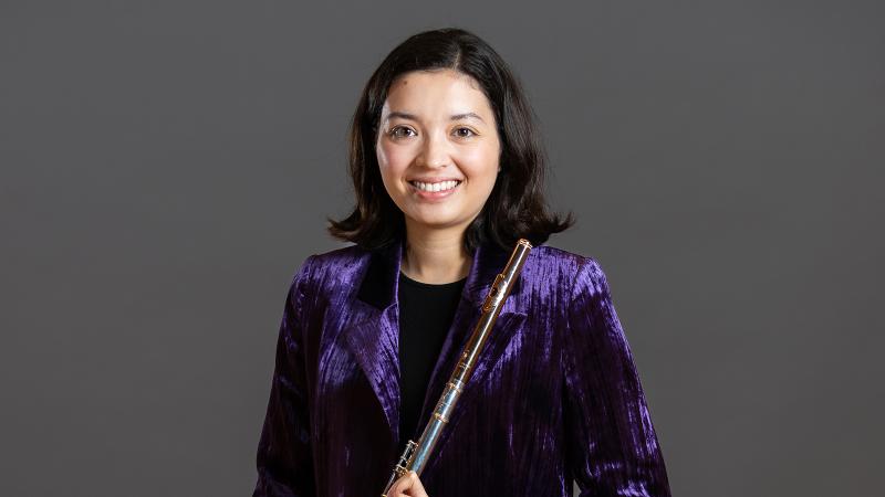 Headshot of a student holding a flute.