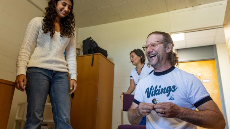in residential room with parents