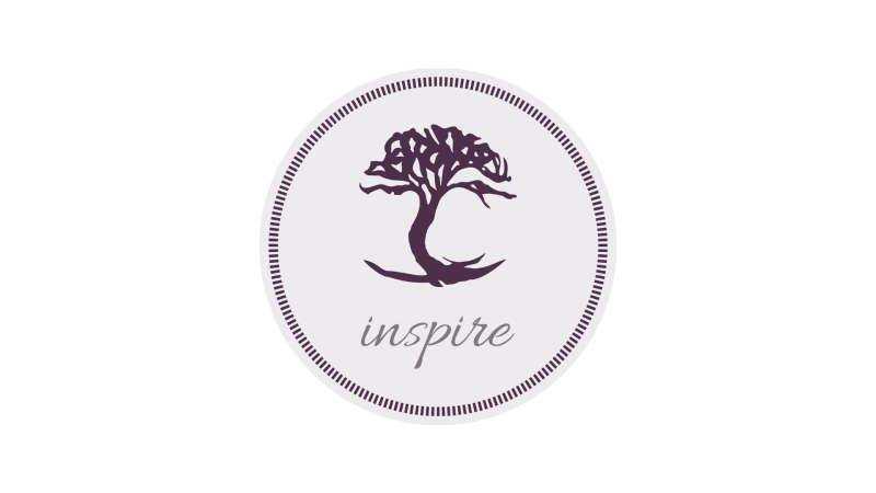 logo with a tree and the word inspire under it