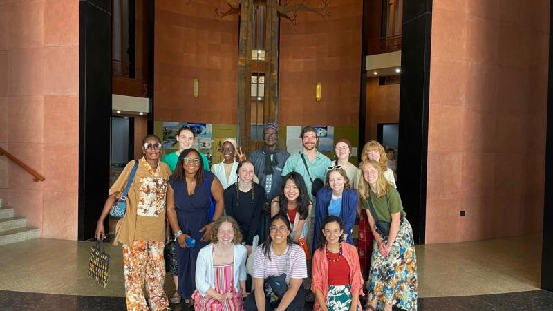 Students and Sarah at the Musée des Civilisations Noires in the atrium