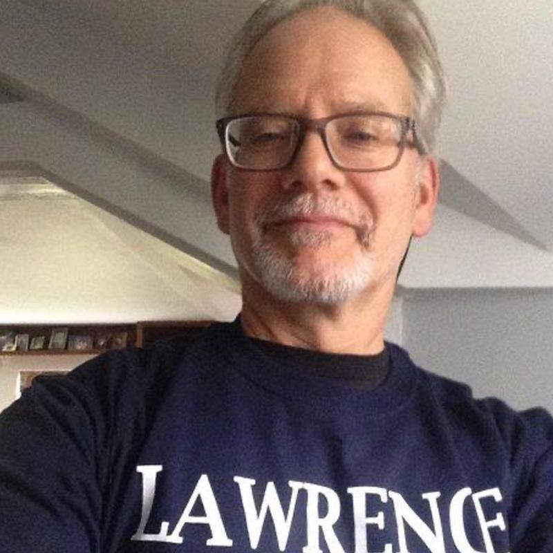 Campbell Scott wearing Lawrence University shirt