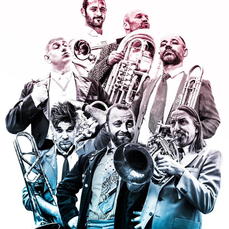 The performing group Mnozil Brass with their instruments, fading from red to blue at the bottom of the image.