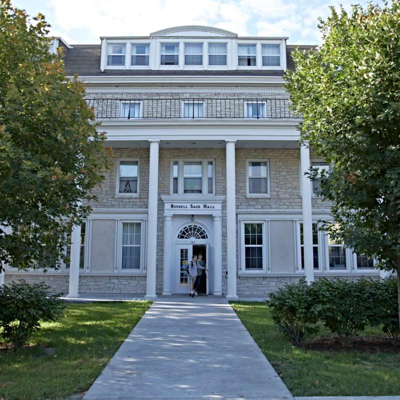 students exiting sage hall