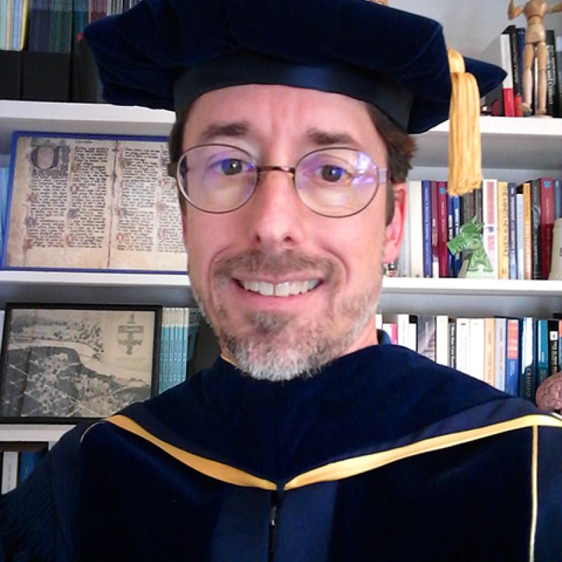 Picture of Bob Williams in academic regalia