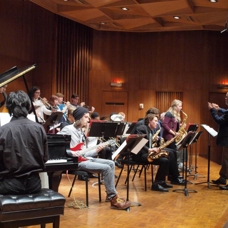 Members of Lawrence University's Jazz Workshop perform on stage.