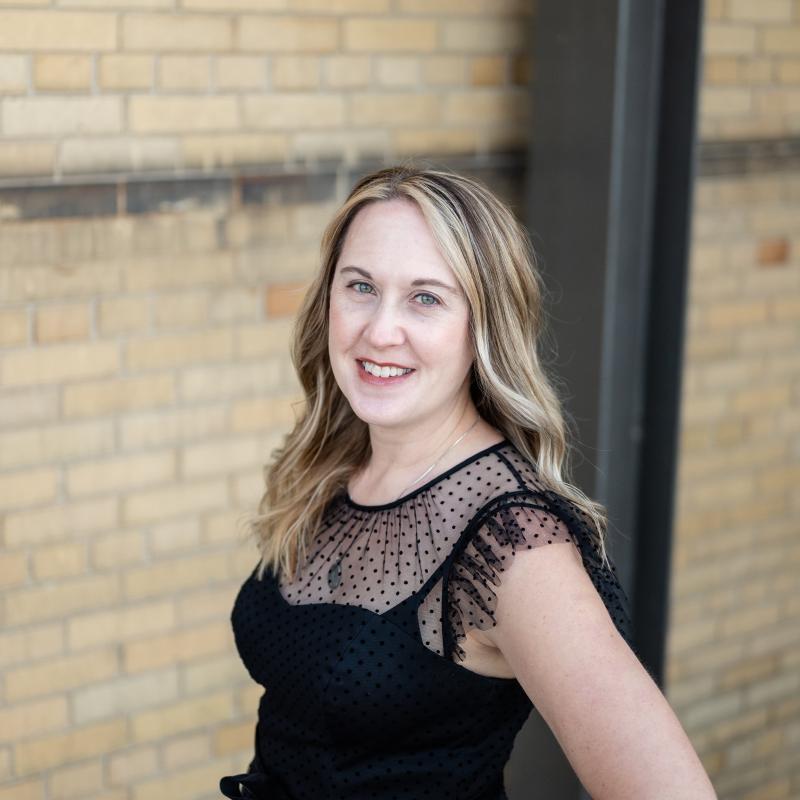 Theresa Martin with bricked background