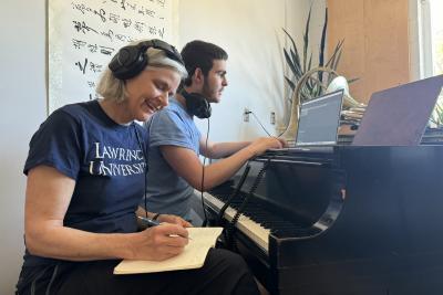 Ann Ellsworth and Leo Rodda take notes on their meditation arrangements.