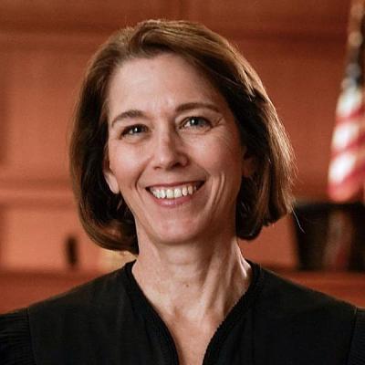 Susan Crawford '87, English major, in robes in courtroom for profile pic