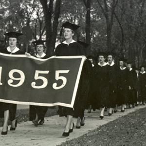 Milwaukee-Downer College class of 1955 marching with banner