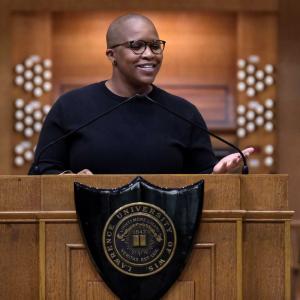 Alexandra Bell stands at the podium on the stage of Memorial Chapel as she delivers her convocation address.