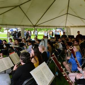 Lawrence Conservatory of Music students perform under tent.