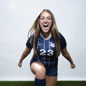 Kaitlyn Khazen celebrates during a photo shoot at Women’s Soccer Media Day.