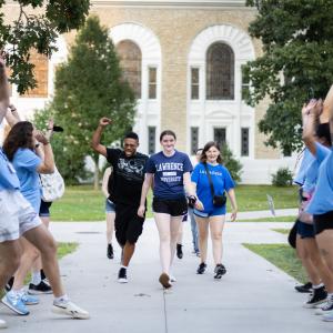 First-year students are cheered on during Welcome Week.