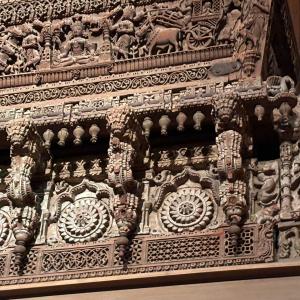 a photo of very ornate wooden carvings. 