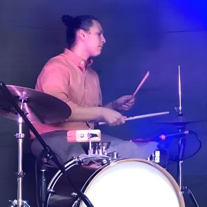 Quintin Wade Fernandez on the drum kit