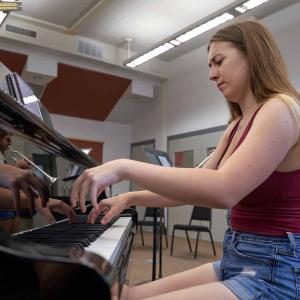 LCMF student practicing piano