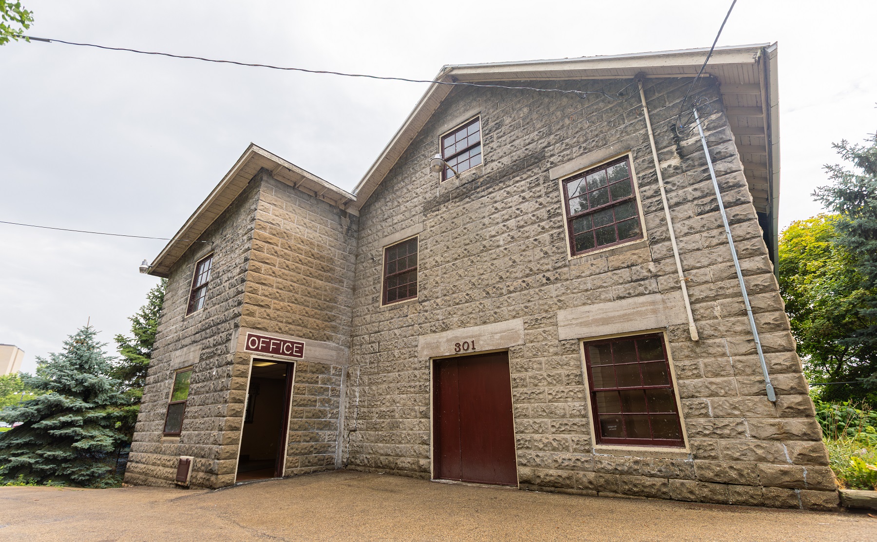 Historic Courtney Woolen Mill building on E. Water Street acquired by Lawrence University